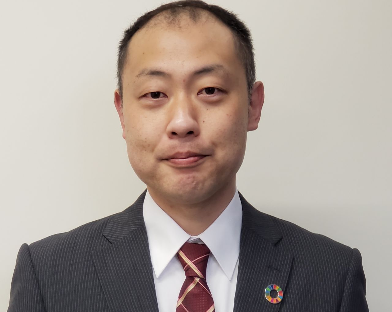 草皆　哲也